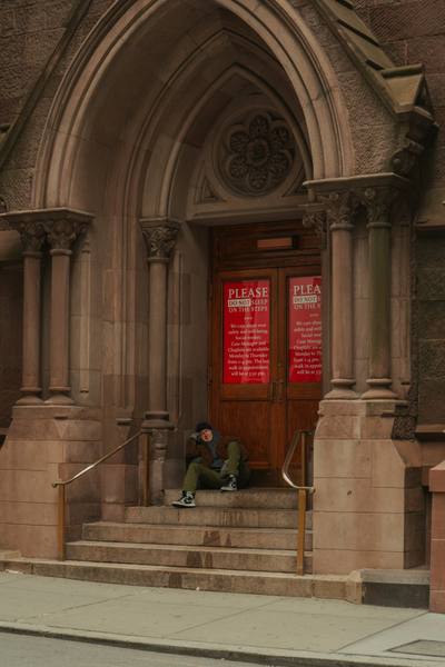 Architectural photography — downtown Manhattan stairway with a man sleeping on it, NYC street documentary by byag.studio