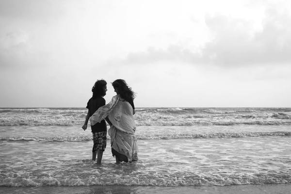 Black-and-white creative couples pre-wedding beach photography — fine-art session, India by byag.studio