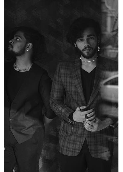 Fashion editorial portrait of two men in suits — men's jewelry brand campaign photography by byag.studio