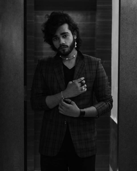 Dramatic black-and-white portrait — men's jewelry brand fine-art campaign by byag.studio